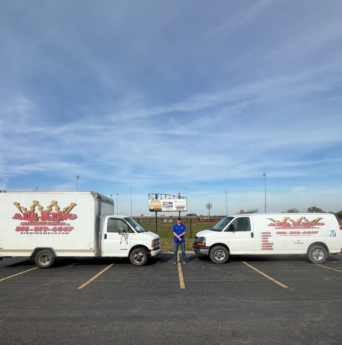 Air King service trucks outside the Lathrop football stadium